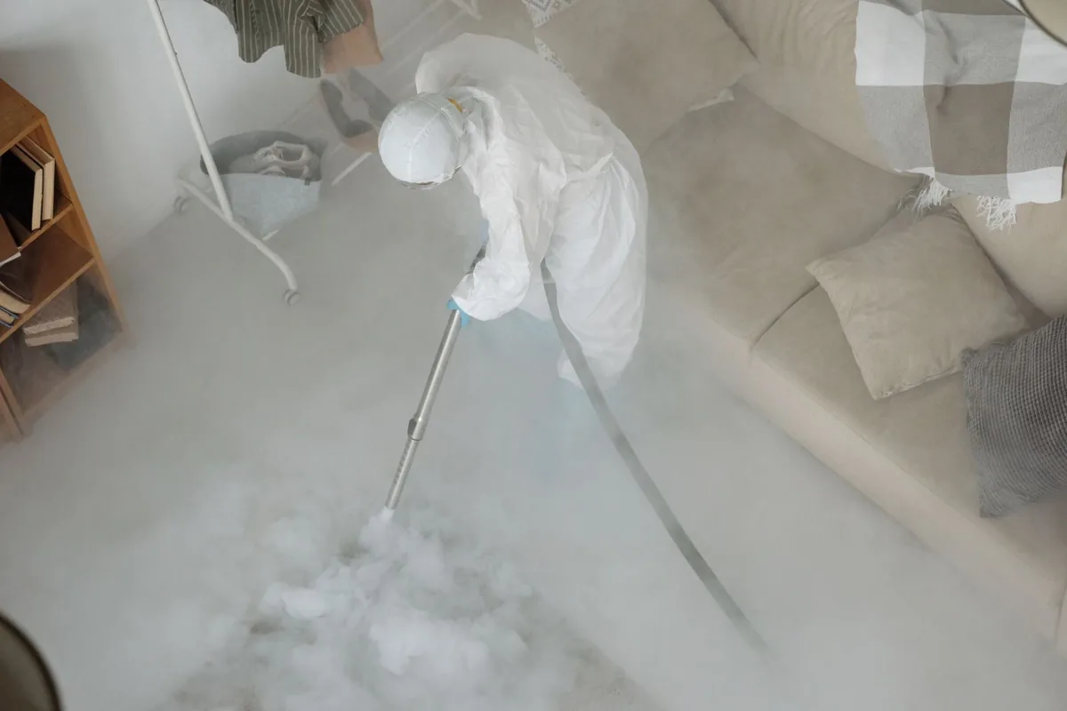 Biohazard cleanup technician in protective equipment, Hernando Beach, FL